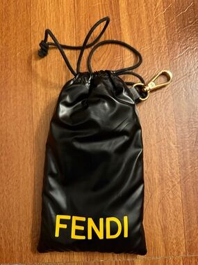 Fendi Black Drawstring Pouch with Yellow Logo and Gold Clip
